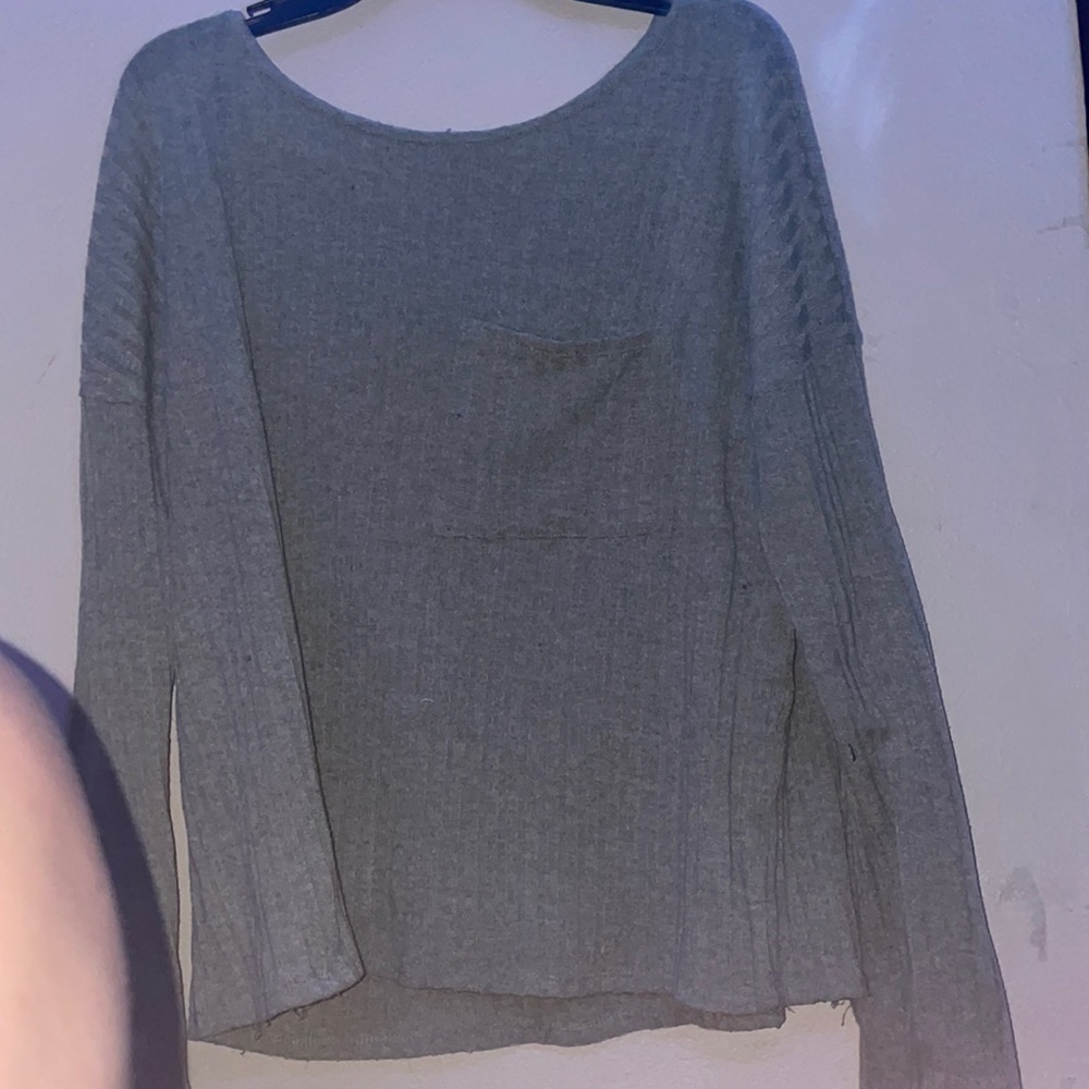 A green long sleeve shirt